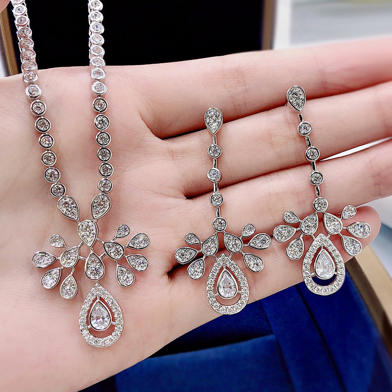 <65> Nora —— Pear moissanite earrings and necklace