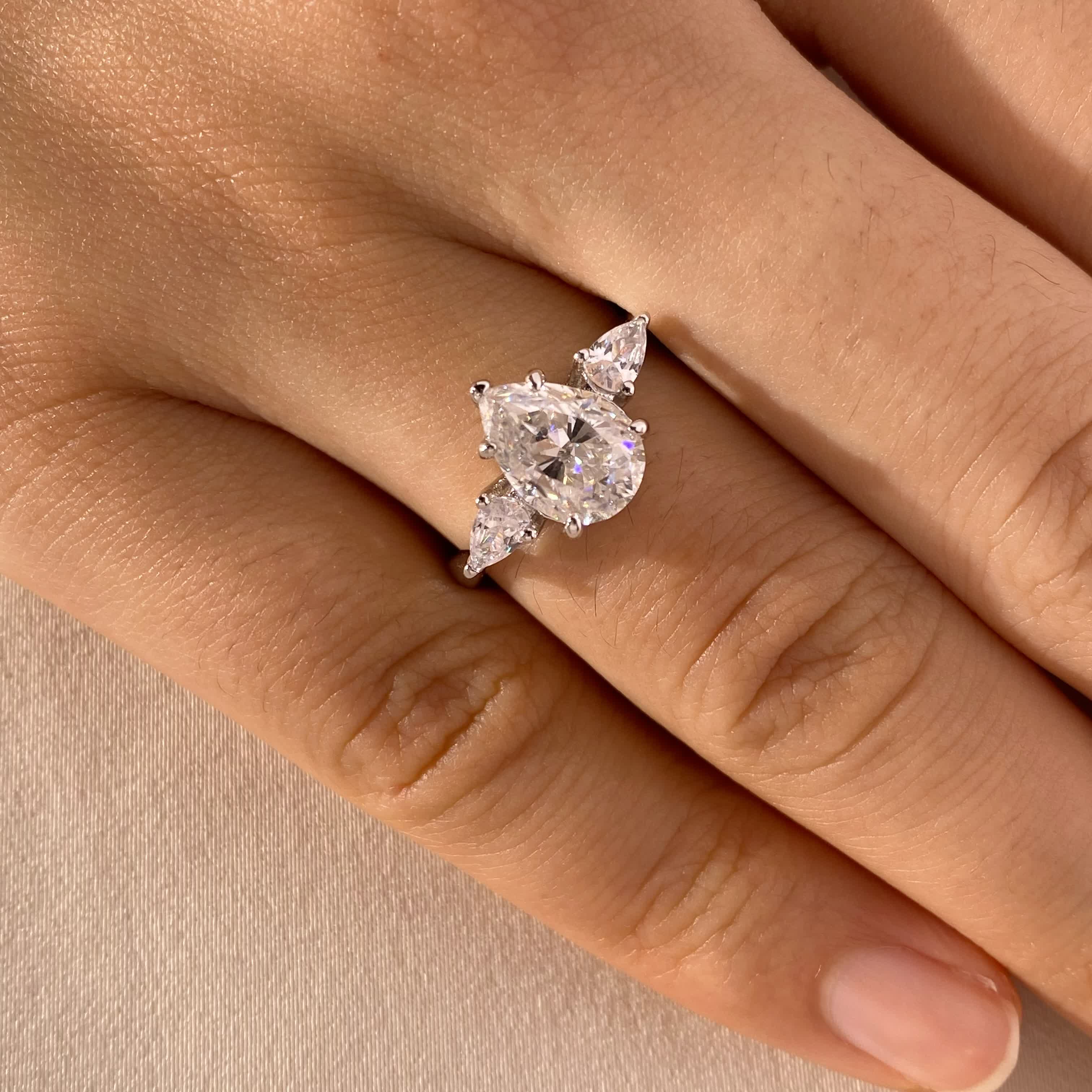 <47>Alyssa —— Pear Trilogy Moissanite Ring